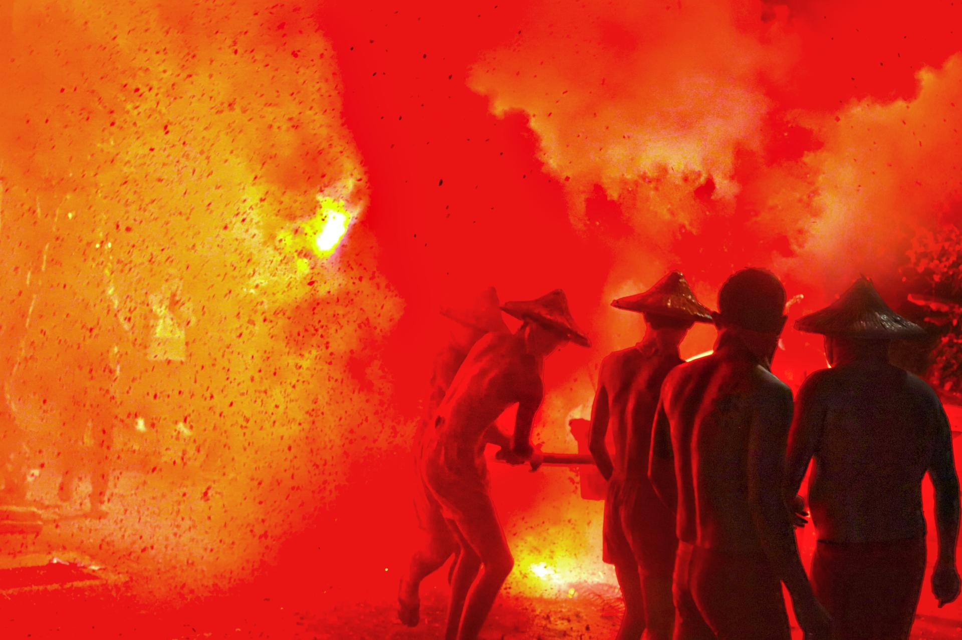 New York Photography Awards Winner -  The firecrackers praying to the Earth God