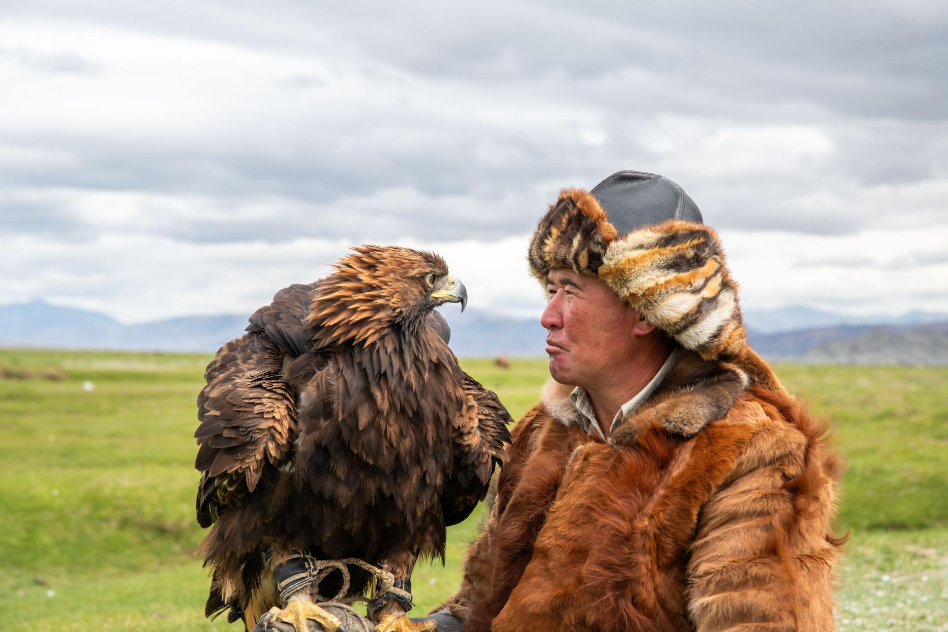 New York Photography Awards Winner - The Unspoken Pact: Eagle and Hunter, Heartfelt Unity